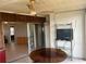 Enclosed patio with tiled flooring, ceiling fan, with sliding glass doors at 13561 Darnell Ave, Port Charlotte, FL 33981