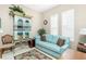 Cozy living room with neutral walls, plantation shutters, and unique decor, showcasing a comfortable and inviting space at 142 Savona Way, North Venice, FL 34275
