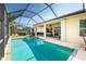 Relaxing screened-in pool and spa area with ample seating and a covered lanai, perfect for outdoor enjoyment at 142 Savona Way, North Venice, FL 34275