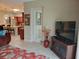 Living area showcases an open-concept design and seamless flow into the kitchen at 142 Yellow Pine Dr, Rotonda West, FL 33947