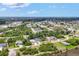 The expansive neighborhood is surrounded by canals, mature trees, and beautiful landscaping at 143 Crevalle Rd, Rotonda West, FL 33947