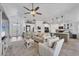 Spacious living area with an open floor plan connecting the kitchen and dining spaces at 143 Crevalle Rd, Rotonda West, FL 33947