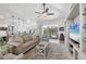Bright, open living room with comfortable seating and views of the pool at 143 Crevalle Rd, Rotonda West, FL 33947