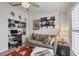 Bright home office space featuring a computer desk and comfortable couch at 143 Crevalle Rd, Rotonda West, FL 33947