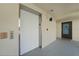 Well-maintained hallway features an elevator and a unit entrance, offering convenience and accessibility at 1501 Beach Rd # 303, Englewood, FL 34223