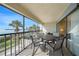 Inviting lanai with seating, dining, and scenic waterfront vistas, offering relaxation at 1501 Beach Rd # 303, Englewood, FL 34223