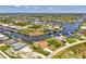 Waterfront homes line canals offering direct access to the Gulf of Mexico and stunning water views at 15020 Acorn Cir, Port Charlotte, FL 33981