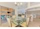 Inviting dining area with access to the lanai, pool, and adjacent living areas at 15020 Acorn Cir, Port Charlotte, FL 33981
