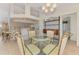Open dining area with a view of the kitchen and living spaces at 15020 Acorn Cir, Port Charlotte, FL 33981