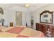 Spacious main bedroom features high ceilings and decorative lamps at 15020 Acorn Cir, Port Charlotte, FL 33981