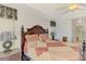 Comfortable main bedroom includes a decorative bedframe, and lamps at 15020 Acorn Cir, Port Charlotte, FL 33981