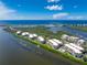 Panoramic aerial view of beachfront condo community and ocean views in a beautiful seaside location at 1551 Beach Rd # 212, Englewood, FL 34223