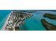 Scenic aerial view of a beach community located on a waterway with ocean access in beautiful Florida at 1551 Beach Rd # 212, Englewood, FL 34223