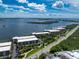 Aerial view of waterfront condos along the coastline with stunning water views at 1551 Beach Rd # 212, Englewood, FL 34223