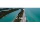Picturesque aerial view of a waterway leading to the ocean, showcasing the area's natural beauty at 1551 Beach Rd # 212, Englewood, FL 34223