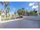 Outdoor balcony with tropical landscaping and community views at 1551 Beach Rd # 212, Englewood, FL 34223