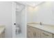Bright bathroom with a granite vanity and a separate toilet room at 1551 Beach Rd # 212, Englewood, FL 34223