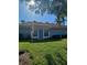 Charming single story home with manicured lawn, front door, and updated windows at 1551 Beach Rd # 212, Englewood, FL 34223