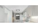Bright kitchen features modern appliances, stylish lighting, and an open layout at 1551 Beach Rd # 212, Englewood, FL 34223