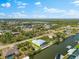 A beautiful home nestled on a scenic canal, surrounded by lush greenery at 15850 Viscount Cir, Port Charlotte, FL 33981