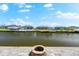 Canal view featuring lush landscaping, dockage and waterfront living at its finest at 15850 Viscount Cir, Port Charlotte, FL 33981
