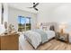 Bright bedroom with a waterfront view from a private patio at 15850 Viscount Cir, Port Charlotte, FL 33981