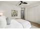 Bright bedroom featuring a ceiling fan and stylish accents at 15850 Viscount Cir, Port Charlotte, FL 33981