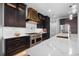 Elegant kitchen featuring an island, modern range, and sleek countertops at 15850 Viscount Cir, Port Charlotte, FL 33981