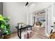 Inviting home office with a view of the pool and living space at 15850 Viscount Cir, Port Charlotte, FL 33981