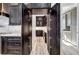 Walk-in pantry with custom cabinetry and lighting at 15850 Viscount Cir, Port Charlotte, FL 33981