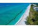 Beautiful aerial view of the beach and the Gulf of Mexico, with crystal clear water at 1605 Manor Rd, Englewood, FL 34223