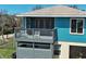 Close-up of a charming balcony with seating, offering a cozy outdoor retreat and view at 1605 Manor Rd, Englewood, FL 34223