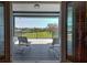 Scenic view from porch highlighting the serene backyard and waterfront at 1605 Manor Rd, Englewood, FL 34223