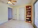 Storage room featuring shelving for organization and access to the outside at 1605 Manor Rd, Englewood, FL 34223