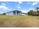 Discover the expansive backyard with a covered patio in this inviting single-Gathering home at 1664 Karluk St, North Port, FL 34287
