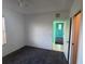 Bedroom with neutral carpet, and doorway leading to the rest of the home at 169 Boundary Blvd # 169P, Rotonda West, FL 33947