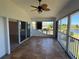 Lanai with tile flooring and sliding glass doors, offering seamless transition to outdoor living at 169 Boundary Blvd # 169P, Rotonda West, FL 33947
