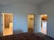 View from main bedroom, showing bathroom entrance, closet and kitchen space at 169 Boundary Blvd # 169P, Rotonda West, FL 33947