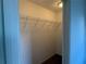 Walk-in closet with metal shelving at 169 Boundary Blvd # 169P, Rotonda West, FL 33947