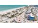 High angle view capturing a scenic coastal community, palm trees and vibrant cityscape along the beach at 1691 Lakeview Pl, Englewood, FL 34223