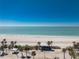 Expansive beach vista showcases white sands, clear turquoise waters, and palm-lined landscapes at 1691 Lakeview Pl, Englewood, FL 34223