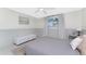 Cozy bedroom featuring soft natural light and calming coastal decor at 1691 Lakeview Pl, Englewood, FL 34223