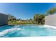 Relaxing hot tub offers serene water views, perfect for unwinding and enjoying the tranquility of the outdoors at 1691 Lakeview Pl, Englewood, FL 34223