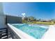 Unwind in this inviting hot tub, offering a perfect blend of relaxation and scenic views of the surrounding landscape at 1691 Lakeview Pl, Englewood, FL 34223