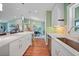 The Kitchen showcases open concept design with a connection to living room and dining space at 171 Mark Twain Ln, Rotonda West, FL 33947