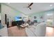 Inviting living room featuring contemporary furniture, stylish lighting, and a relaxed atmosphere, ideal for modern living at 171 Mark Twain Ln, Rotonda West, FL 33947
