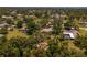 This property is nestled among mature trees, offering a peaceful and secluded environment with neighborhood views at 1712 Fessler St, Englewood, FL 34223