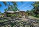 Well-maintained home with manicured landscaping at 1712 Fessler St, Englewood, FL 34223