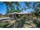 Beautiful home with a well-manicured lawn at 1712 Fessler St, Englewood, FL 34223