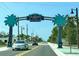 West Dearborn Street entrance to Englewood features palm trees and welcoming signage at 1712 Fessler St, Englewood, FL 34223